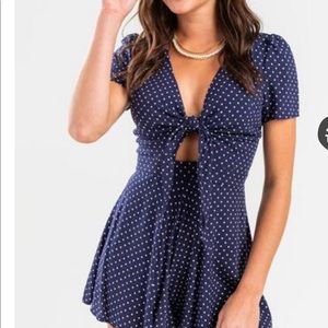 Navy blue polka dot romper